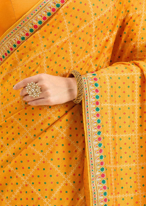 Mustard Soft Raw Silk Bandhej Gold Zariwork Saree With Matching Blouse Piece