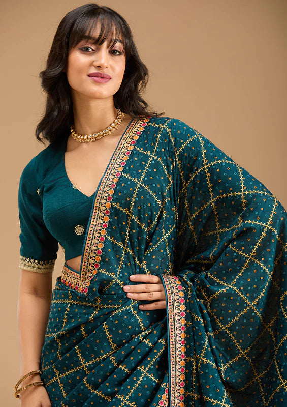 Peacock Blue Soft Raw Silk Bandhej Gold Zariwork Saree With Matching Blouse Piece
