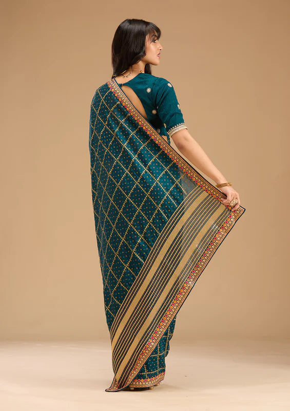 Peacock Blue Soft Raw Silk Bandhej Gold Zariwork Saree With Matching Blouse Piece